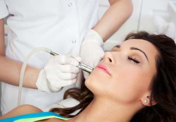 Laser treatment in patient face