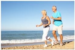 couple jogging on the beach