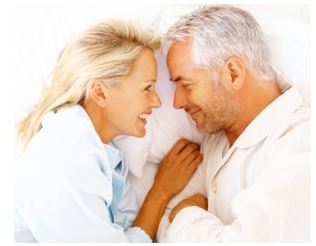 happy couple regarding good sexual health